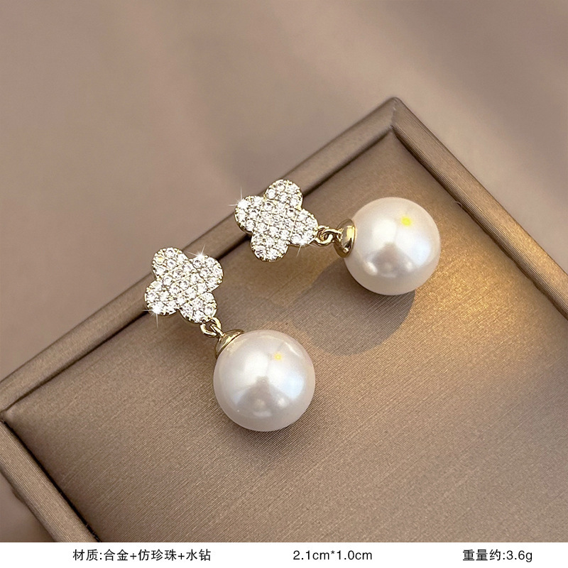 S925銀真珠の花のピアスの女性の贅沢な高級感があります。|undefined