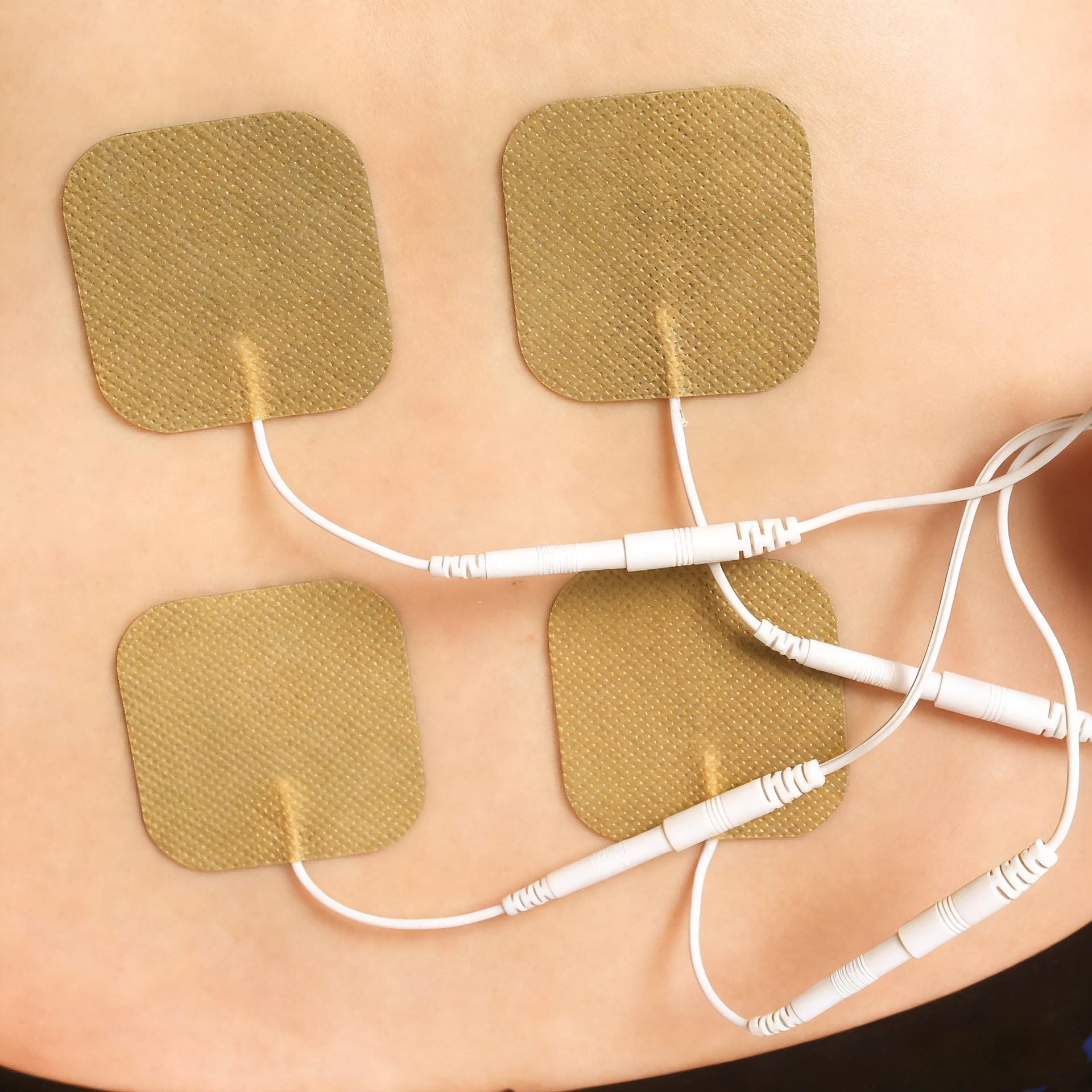 Spot electrodo de fisioterapia 5 * 5CM gel de tela no tejida 2.0 / 2.5 conector accesorios de masaje parche de electrodo