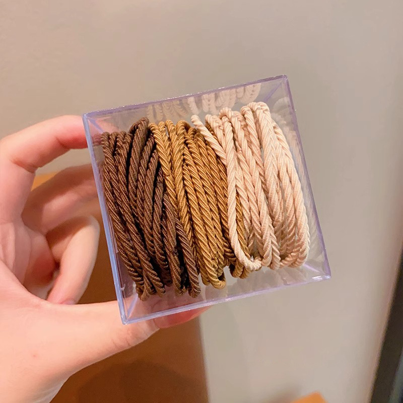 Alta elasticidad y durabilidad banda de goma simple cuerda de cabello de mujer corda de cabello de verano temperamento de cola de caballo color no daña anillo de cabello