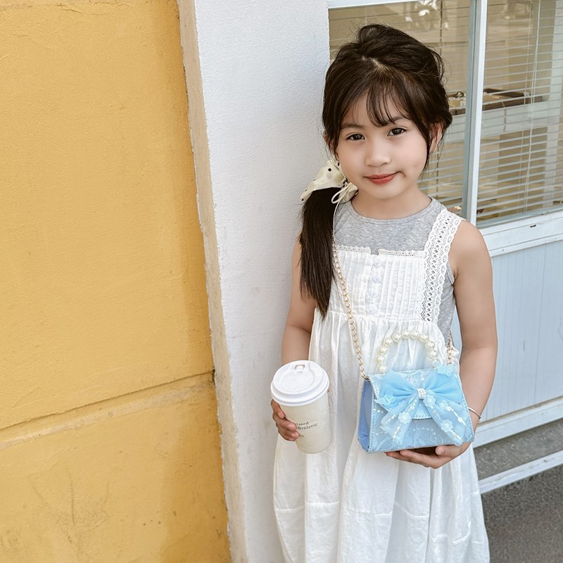 Bonito pequeño viento de la princesa viento bolso de perlas bolso de mano bolso de hombro para niños arco