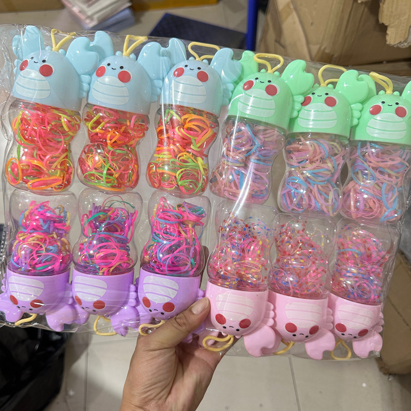 Nueva historieta embotellada banda de goma desechable fuerte tirón de los niños banda de pelo Color Negro cabeza de bebé cuerda caso de cuero