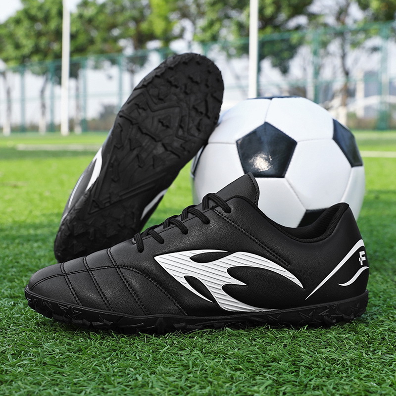 Nuevos zapatos de fútbol antideslizantes transfronterizos, zapatos de entrenamiento de fútbol de clavos cortos para adultos, niños y niñas.
