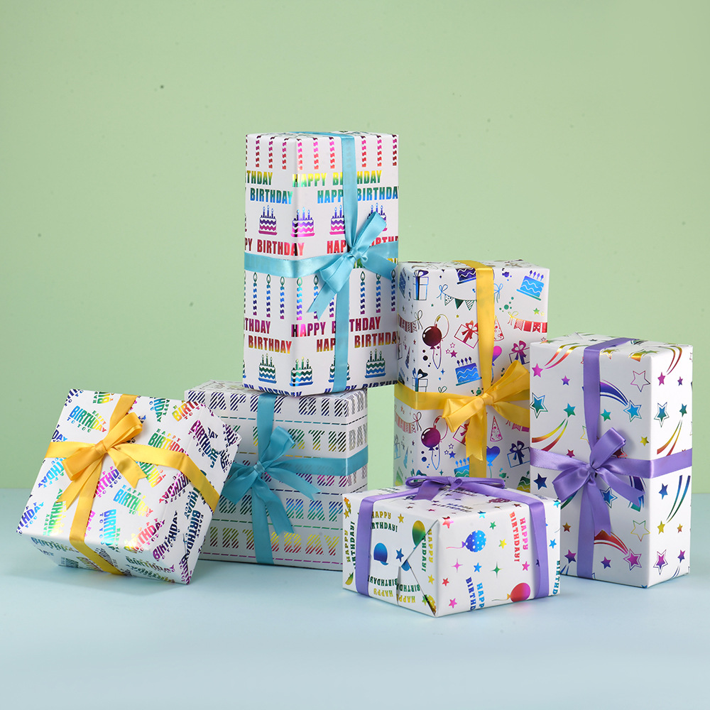 Nuevo papel de regalo transfronterizo día de San Valentín carta de globo de cumpleaños vela estrella colorida estampado papel de embalaje de regalo