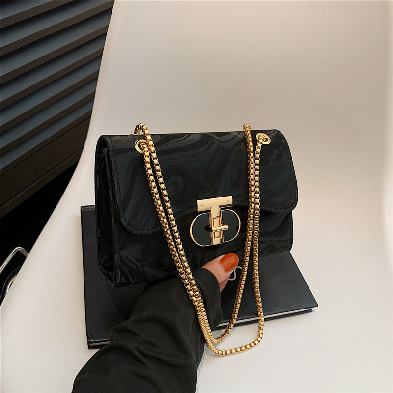 Nicho bolso de diseño bolso de mujer nuevo estilo de moda de marea de viento de bloqueo de hombro mochila de textura de cadena pequeña bolsa cuadrada de moda