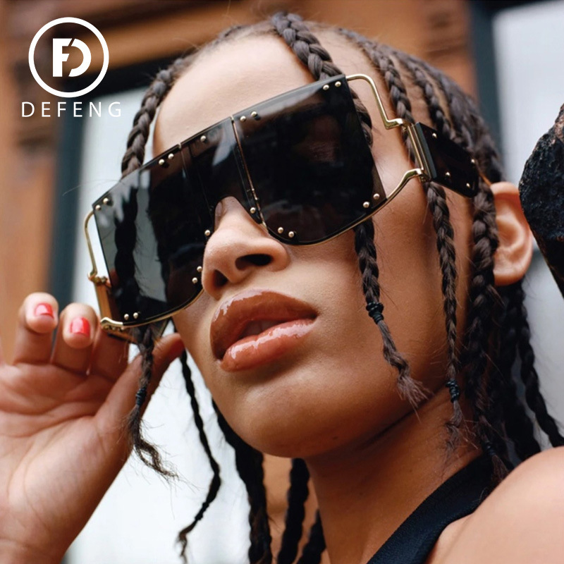 Dejiao new European and American Rihanna sexy sunglasses large frame one-piece goggles coated sunglasses retro punk