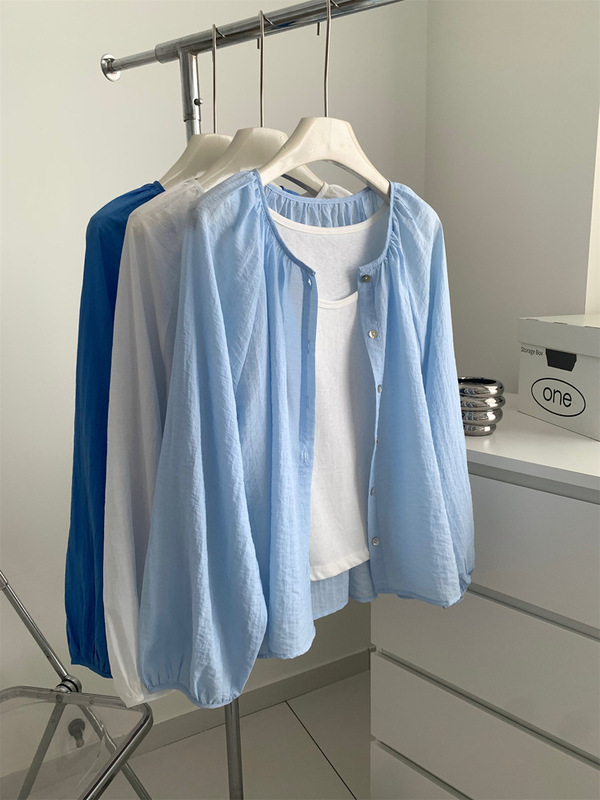 Korean Style Clear Round Neck Sun Protection Shirt for Women, Light and Elegant, Loose Raglan Sleeves, Shell Button Blouse, Air-Conditioned Shirt for Summer Korean Style Clear Round Neck Sun Protection Shirt for Women, Light and Elegant, Loose Raglan Sleeves, Shell Button Blouse, Air-Conditioned Shirt for Summer