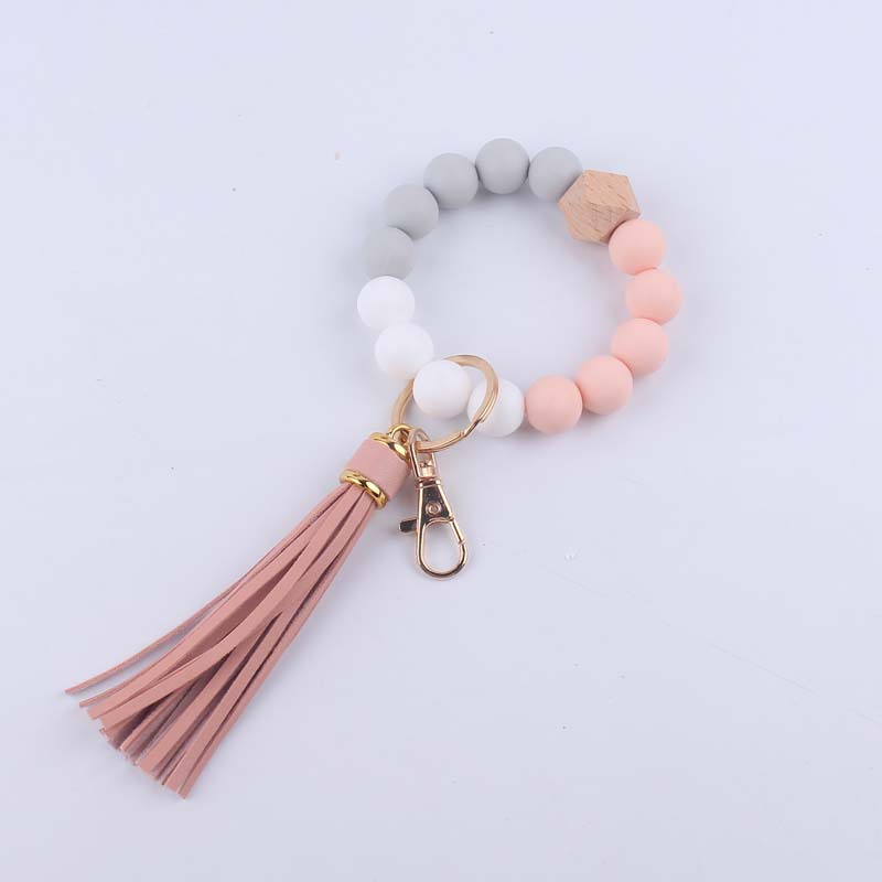 Pulsera de silicona pulsera llavero nuevo creativo DIY borla colgante contraste color