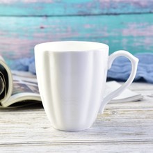 厂家批发创意骨瓷白胎南瓜奶杯日用陶瓷下午茶花茶杯可来样制作