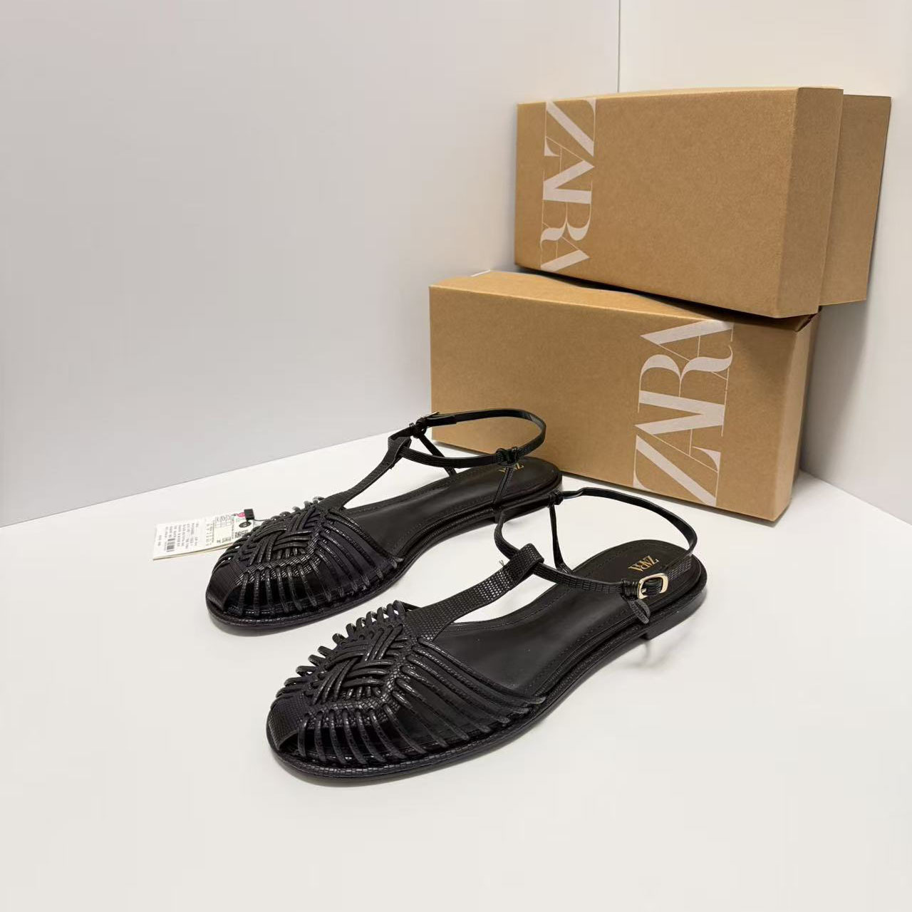ZA2026 nuevo retro cabeza redonda plana zapatos romanos tejidos huecos hebilla de moda sandalias de cabeza