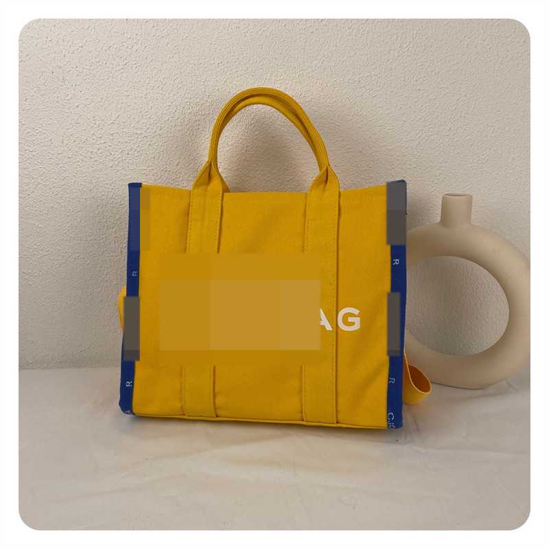 Bolso de mano de gran capacidad Bolso de mensajero de lona simple de moda Bolso de hombro de color de contraste para mujer de moda Simple y versátil