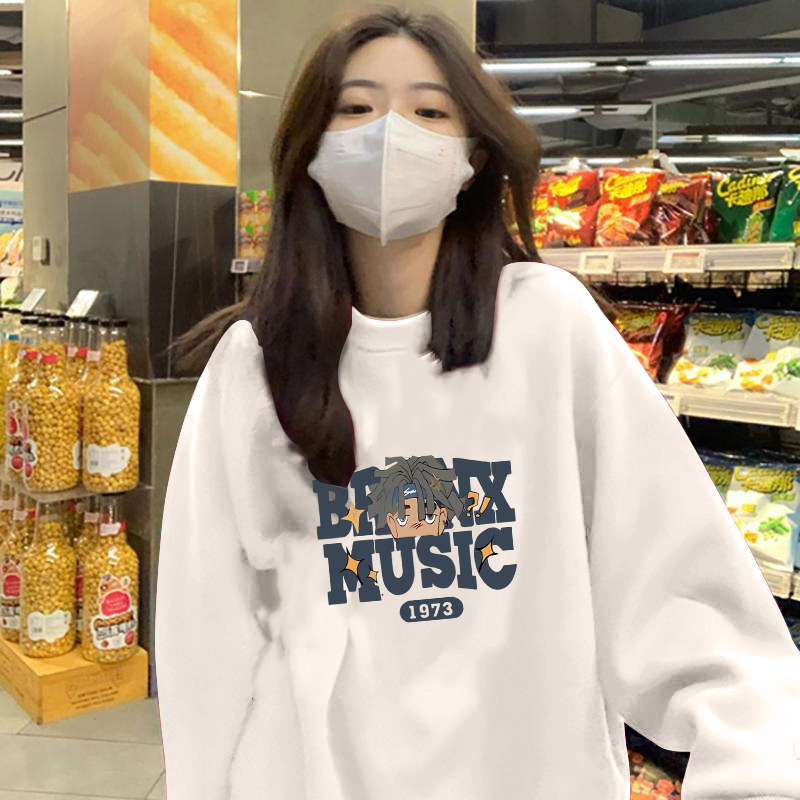 A principios de otoño estilo de hong kong snoopy suéter de cuello redondo camiseta de manga larga de pareja de mujer delgada camiseta de color sólido camiseta de moda