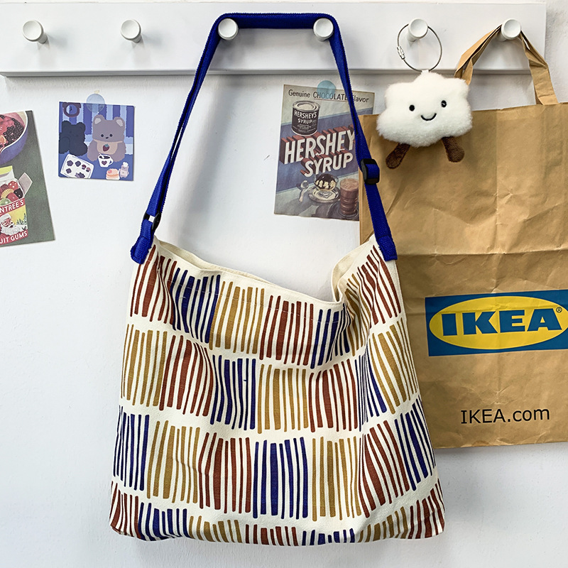 Bolso bandolera de lona para mujer, estilo nuevo de primavera y verano, bolso de hombro de mano literario fresco de gran capacidad, mochila escolar de estudiante con cremallera