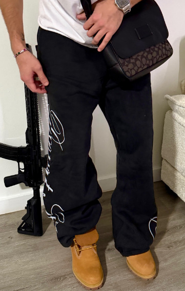 2025 otoño y invierno transfronterizos nuevos pantalones rectos sueltos estilo europeo y americano personalidad hip-hop al por mayor