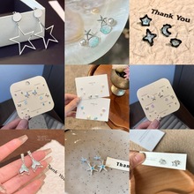 卡通猫爪鲷鱼烧珍珠星星耳钉女小众设计感小巧可爱猫咪小鱼耳饰品
