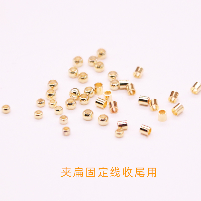 ブレスレットのネックレスの最後のボタンの部品の14kの包みの金の保色の位置決め管の位置決めの玉diyの手でワイヤーの魚の糸を固定します。|undefined