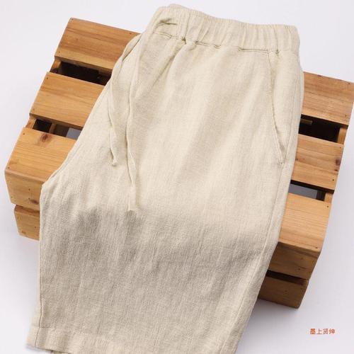 Summer lightweight khaki cotton-linen capri pants for men: solid-color, loose-fit, straight-leg design with elastic waistband—perfect for casual beach wear.