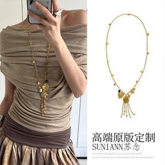 古代文学風! ゴールデンシェルタッセルロングネックレスレディースホリデースタイルニッチセーターチェーンレトロハイエンド