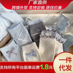 夏の蝶結びの木の耳の縁の中筒の靴下の女性insの蝶結びの復古のかわいい積み重ねの靴下の百合の中筒の靴下