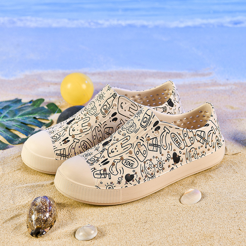 LUCHI zapatos con agujeros pareja verano nuevo estilo graffiti transpirable vadeo hueco hombres y mujeres sandalias de playa casuales en stock