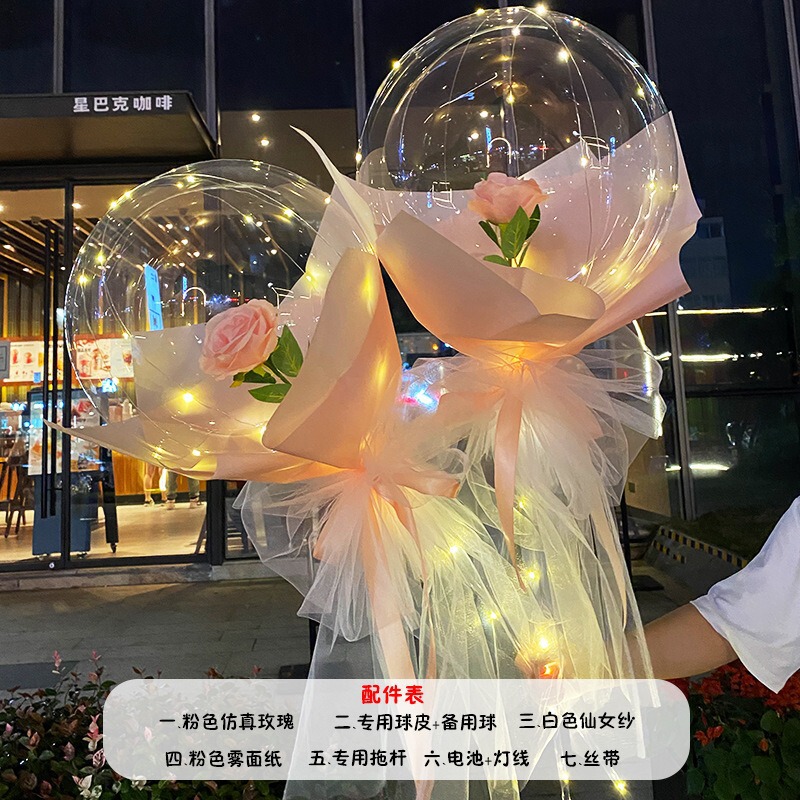 光る夜市の円形の赤い屋台のネットを並べてボールを押して会の風船のイルミネーションの明かりの告白のロマンチックな波の地帯のスーツを押します。|undefined