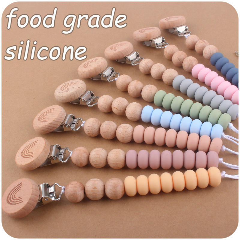 Nuevo bebé arco iris haya clip creativo bebé silicona Cuentas planas espaciador perlas mordedura cadena pezón cadena anti-caída Nuevo