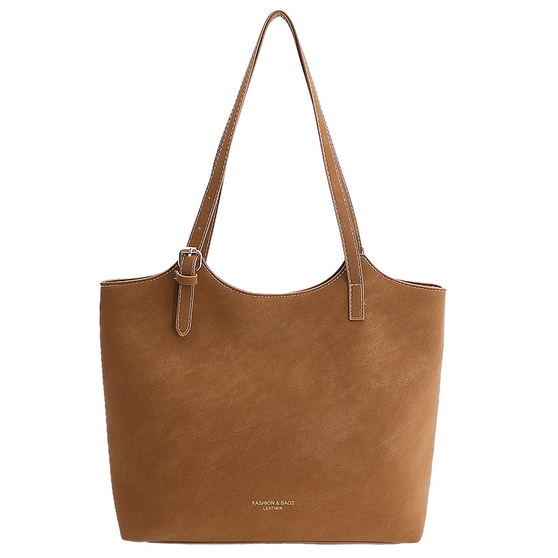 Bolsa de gran capacidad para mujeres 2026 nueva moda bolso de hombro de mujer alta textura versátil bolso de mujer de viaje mate