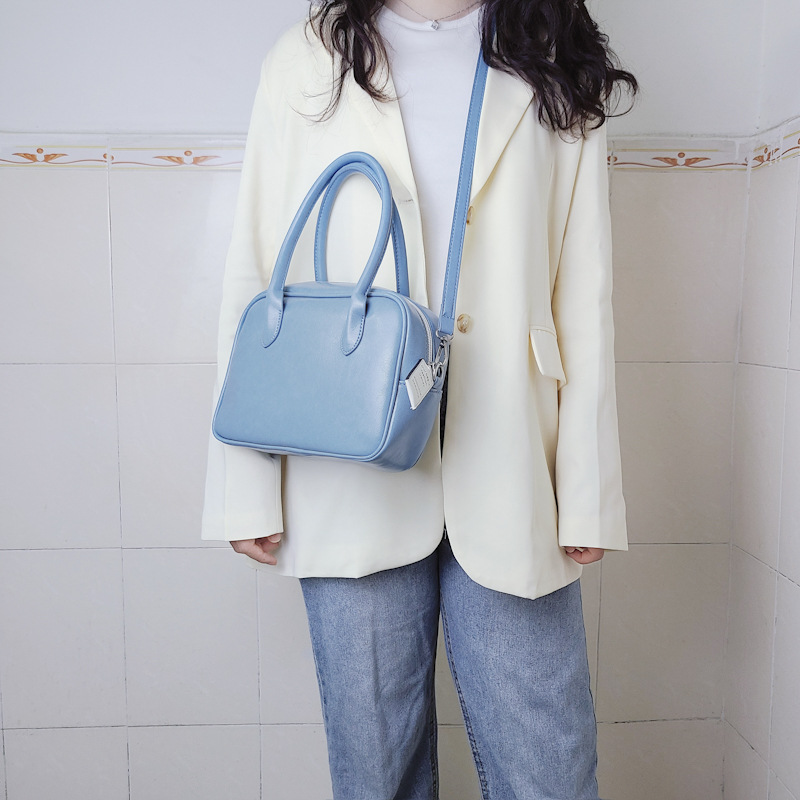 Design di nicchia coreano con la stessa borsa color crema e una borsa elegante, borsa quadrata con croce diagonale a spalla singola_voghion.com