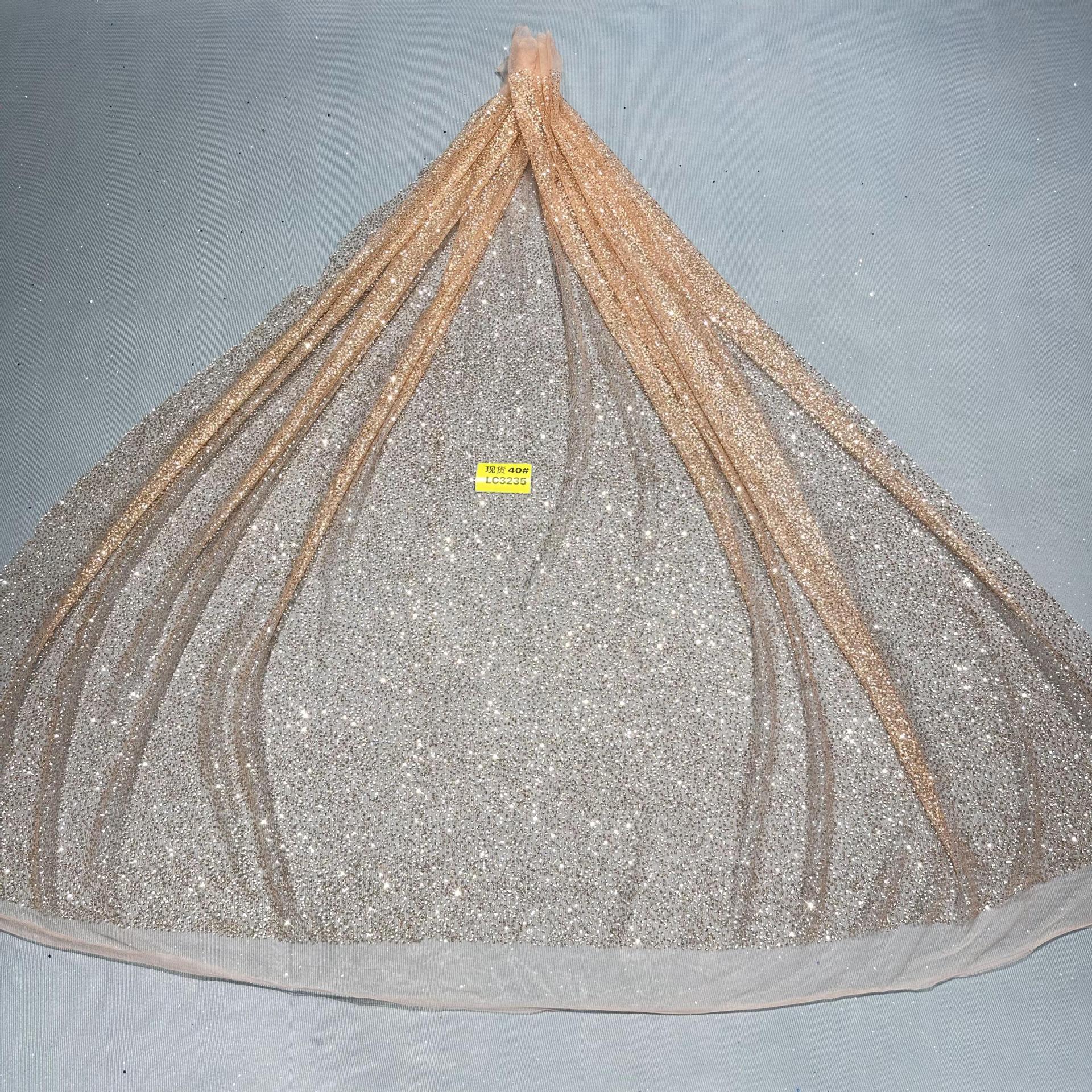 现货洒金花型款花型40#LC3235婚纱礼服面料 网纱 喷金花型面料