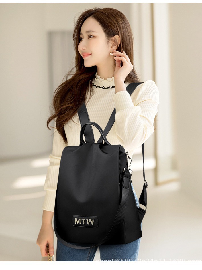 Women's anti-theft backpack 2024 New Oxford cloth letter waterproof backpack fashionable all-match two-shoulder backpack