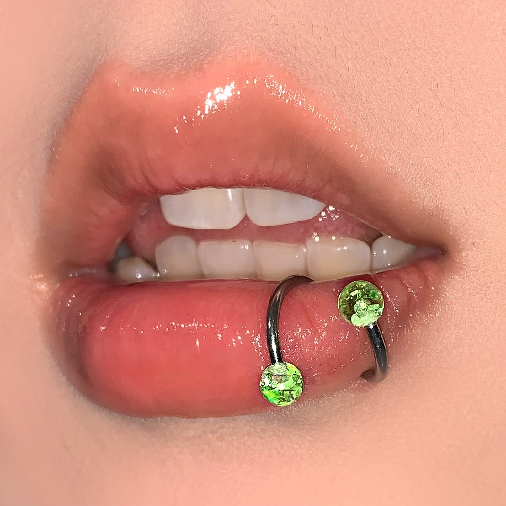 Silver pointed spike labret stud material detail