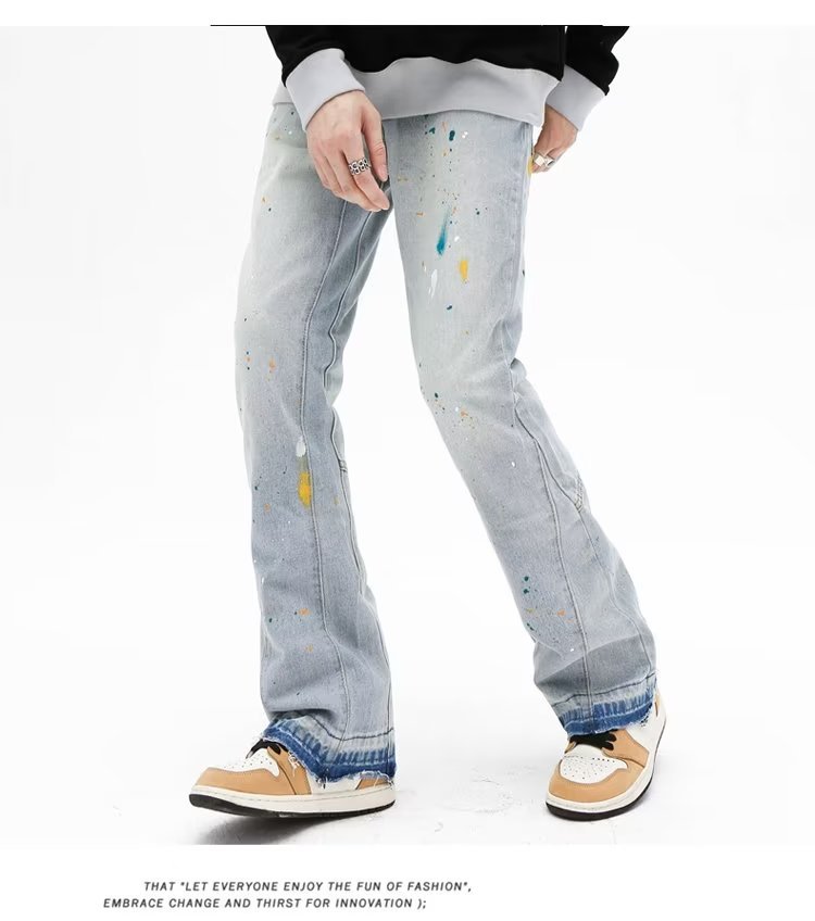 Jeans uomo slim fit stretch con strappi e taglio micro flare_voghion.com