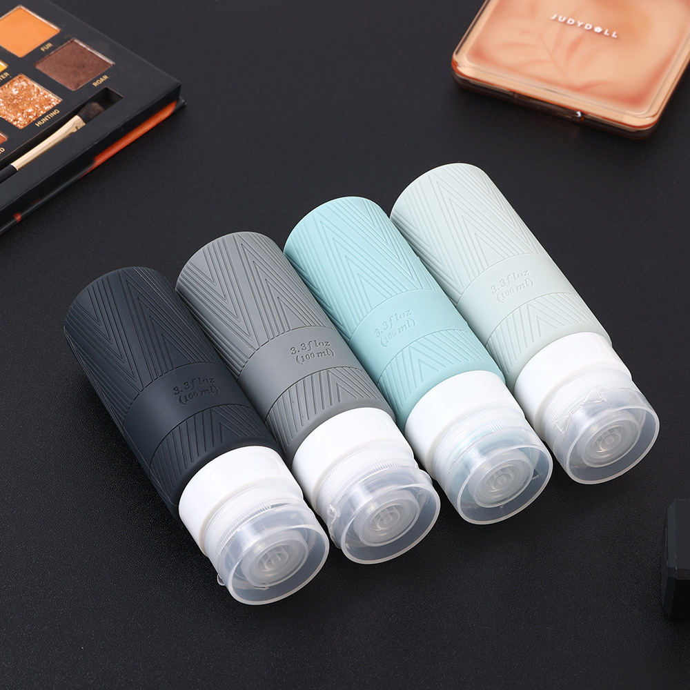 Nuevo transfronterizo de silicona sub-Botella champú loción Lavado y cuidado traje creativo viaje sub-botella prensa