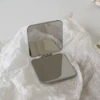 Handheld double-sided square mirror