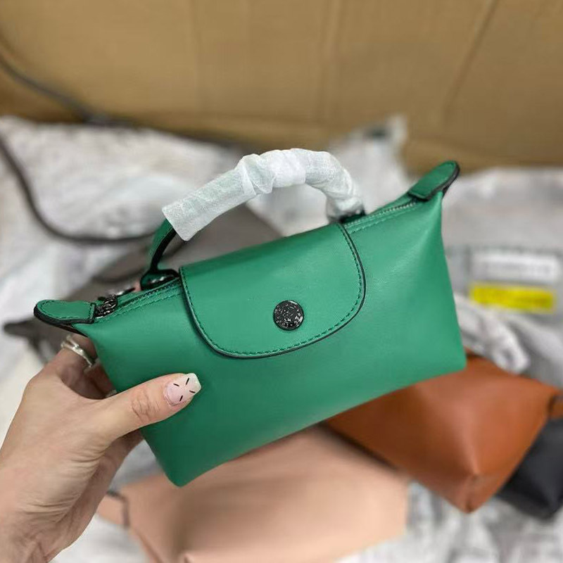 フランスの新しいスタイルのショートハンドルミニラムスキン餃子バッグ多用途ファッショナブルなワンショルダークロスボディクラッチバッグミニ携帯電話バッグ|undefined