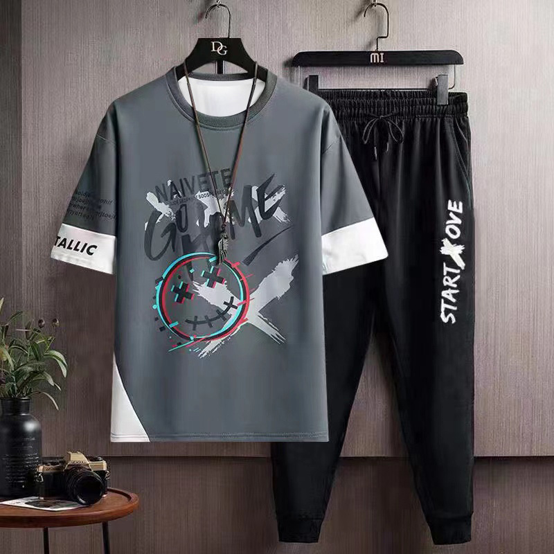 Hip hop Camiseta de manga corta de los hombres de verano de Hong Kong estilo media manga INS de moda todo fósforo camiseta casual pantalones cortos deportivos traje de dos piezas