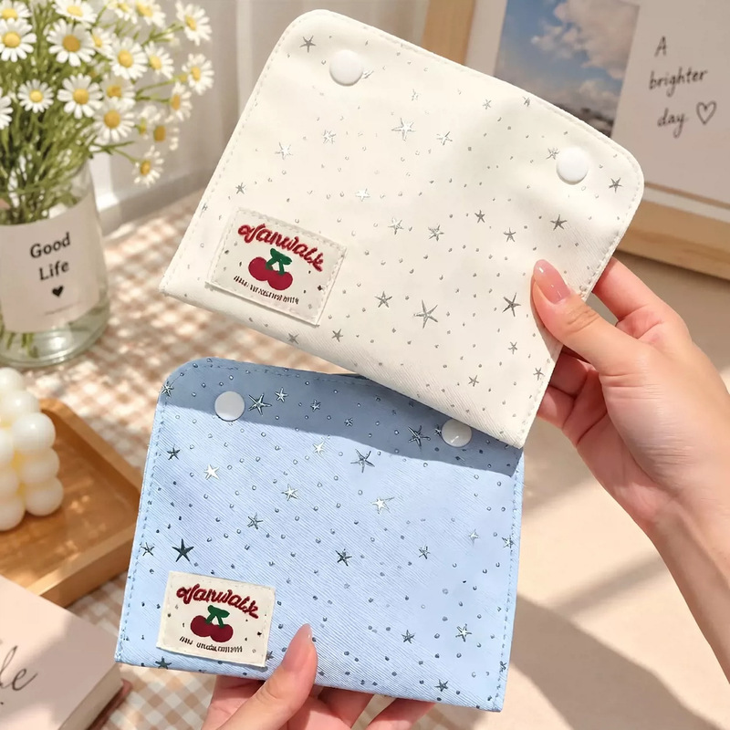 Large-capacity sanitary napkin storage bag with wrist strap and snap closure, suitable for students, for storing cotton pads and sanitary napkins, small cloth bag for storage