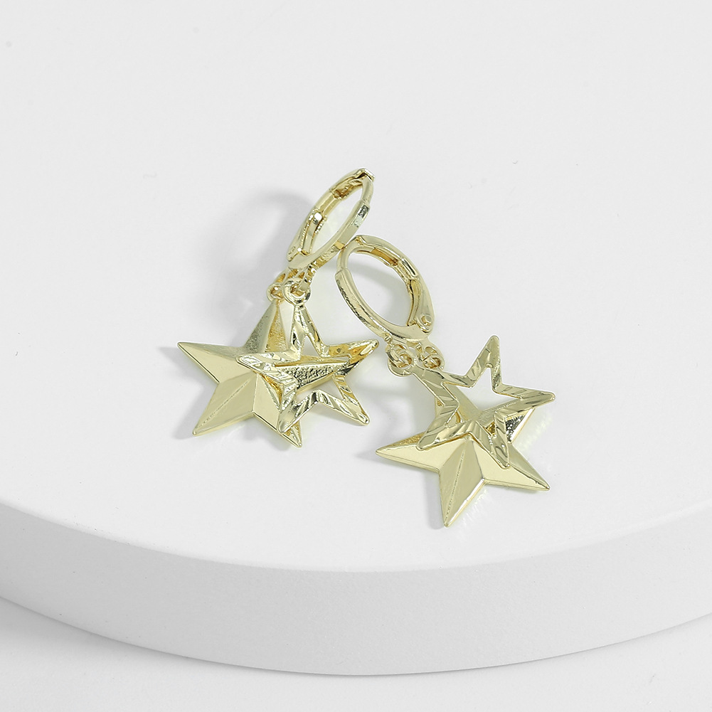 Korean Three-dimensional Eight-pointed Star Copper Earrings Wholesale Nihaojewelry display picture 8