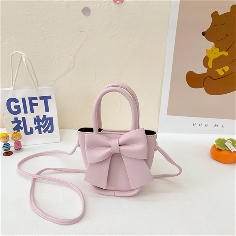 2025 primavera y verano estilo caliente moda casual niños dulces bolsa de gelatina mini bolso de mensajero de un solo hombro variedad al por mayor