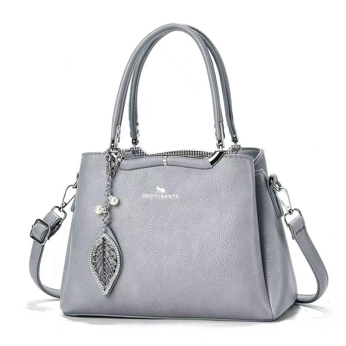 Bolso de mano 2025 nuevo estilo simple y atmosférico estilo coreano moda retro estilo occidental personalidad bolso diagonal de un solo hombro