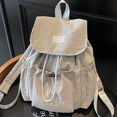 カジュアル、軽量、多用途の女性用バックパック 2025 新しい旅行バックパック キャンバスバッグ 通勤用小型スクールバッグ