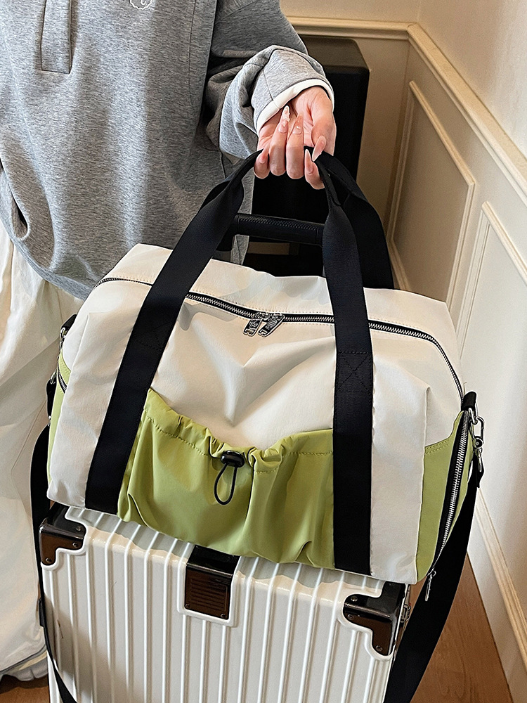 Bolsas deportivas de gran capacidad de ocio, bolsas de viaje de hombro simples de moda para mujeres, bolsas de mano ligeras de tirado.
