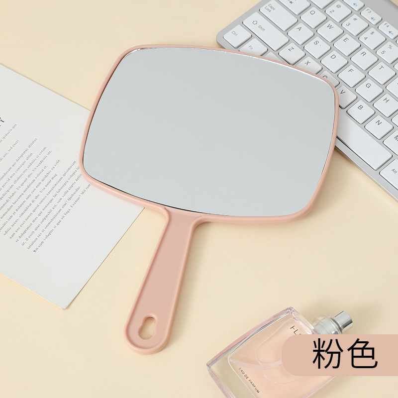 Espejo de maquillaje portátil de gran tamaño multifuncional colgante color sólido HD belleza mango espejo fábrica al por mayor