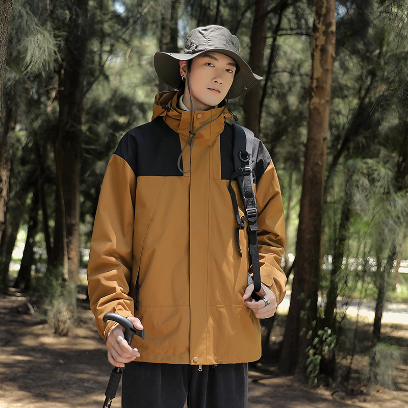 Chaqueta de invierno al aire libre para hombres y mujeres tres en uno de dos piezas de lana engrosada chaqueta de alpinismo a prueba de viento al por mayor en vivo