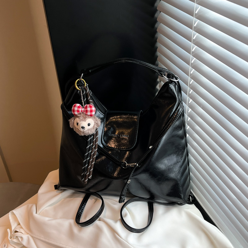 Mochila doble de estilo universitario retro para mujer 2025 verano nuevo bolso de viaje de moda bolso de axila de un solo hombro de gran capacidad