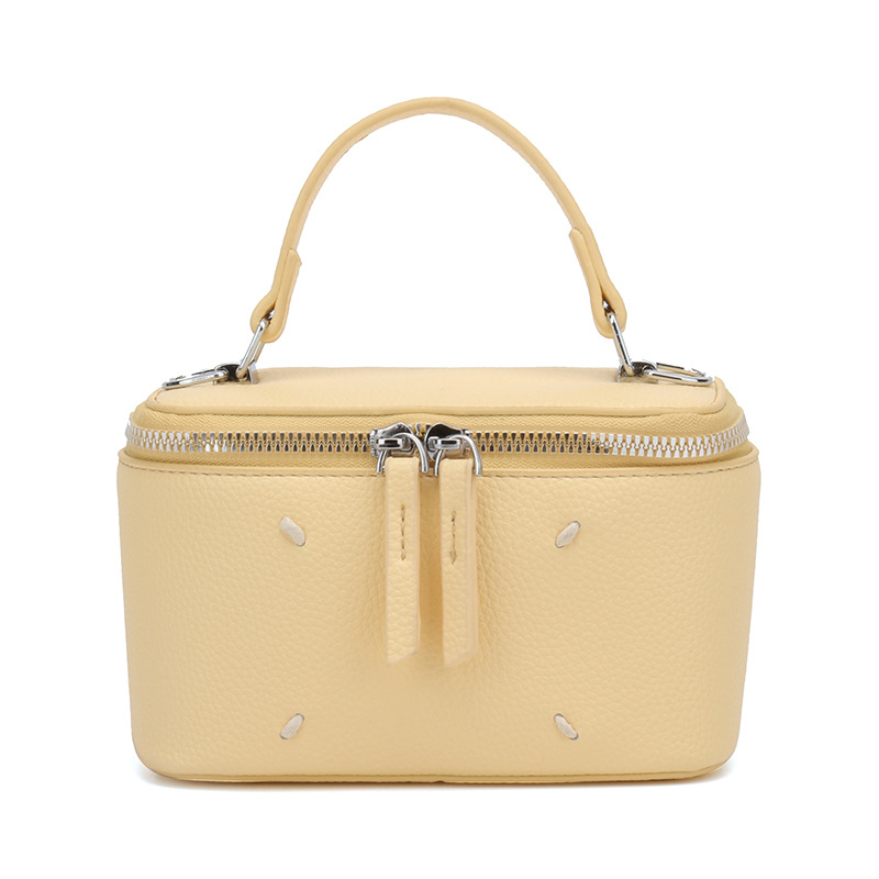 Bolso de caja de estilo occidental de color puro para mujer 2025 nuevo bolso cuadrado pequeño de moda de moda bolso de lonchera de mensajero de un solo hombro de sentido de alta gama