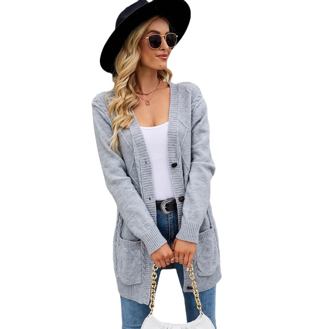 Automne et hiver pull tricoté transfrontalier manteau couleur unie col en v cardigan mi-long bouton ample couleur unie torsion tricoté femmes