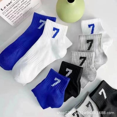 Calcetines primavera y verano niñas tubo medio color sólido mujer todo fósforo jk personalidad de tendencia tubo medio largo color sólido aguja gruesa apilamiento calcetines estilo delgado