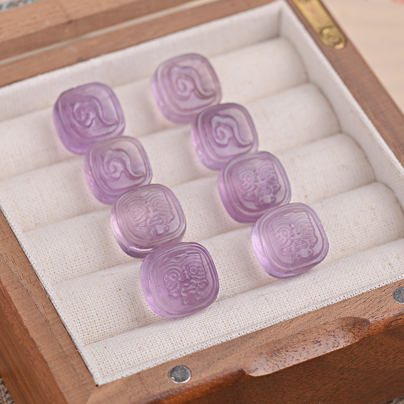organic carved accessory with amethyst