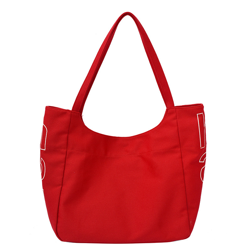 Bolso Tote de moda coreana 2025 verano nuevo estilo bolso femenino casual alfabeto bolso de hombro de lona estilo universitario