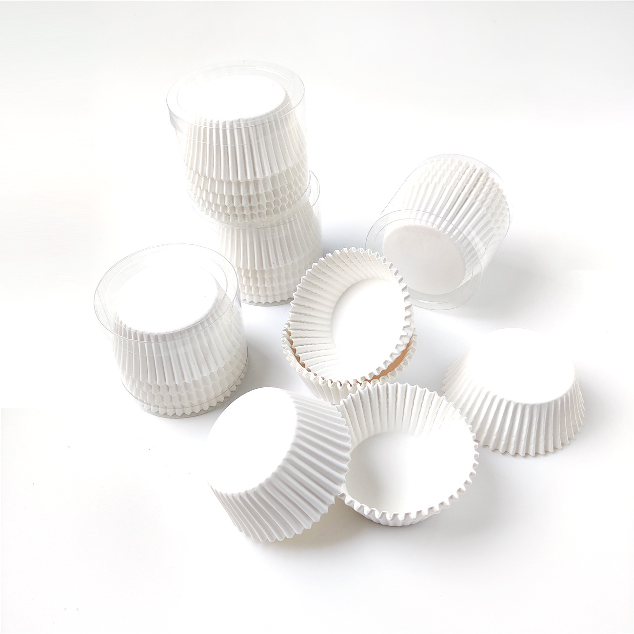 Fábrica directa al por mayor 100% taza de papel de pastel blanco puro 100 barril de papel de horneado resistente a altas temperaturas papel de pastel a prueba de aceite